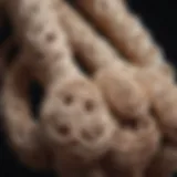 A close-up view of intricately designed wooden macrame beads showcasing their natural grain