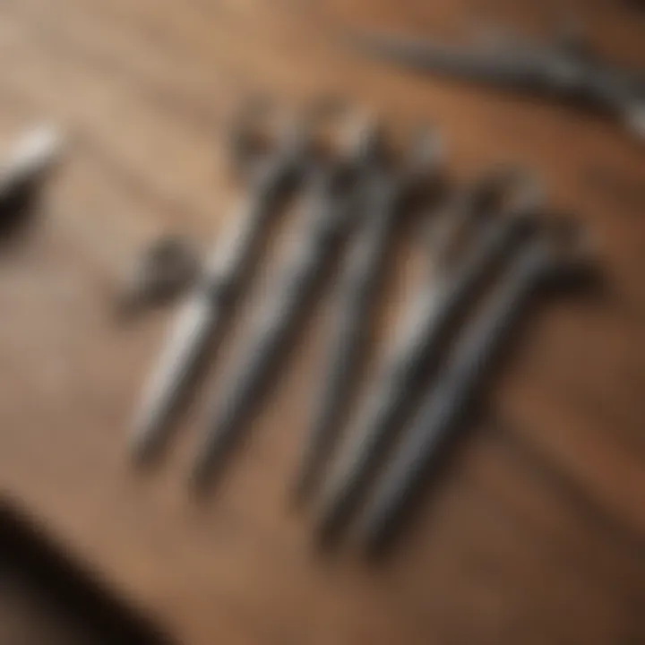 Diverse styles of small trimming scissors displayed on a wooden surface