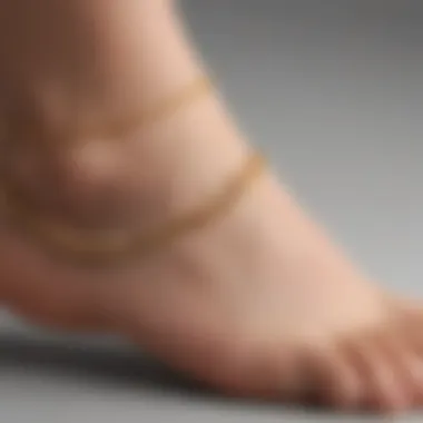 Close-up view of gold anklet extender materials